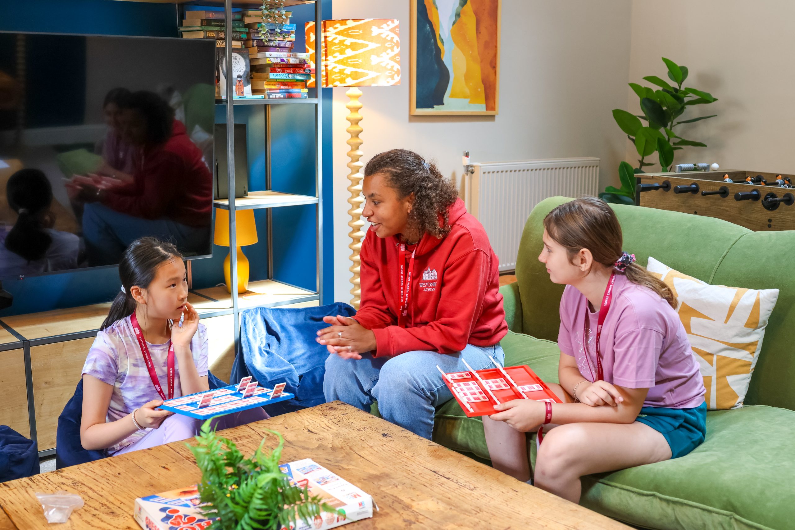 International Summer School pupils relaxing in a common room