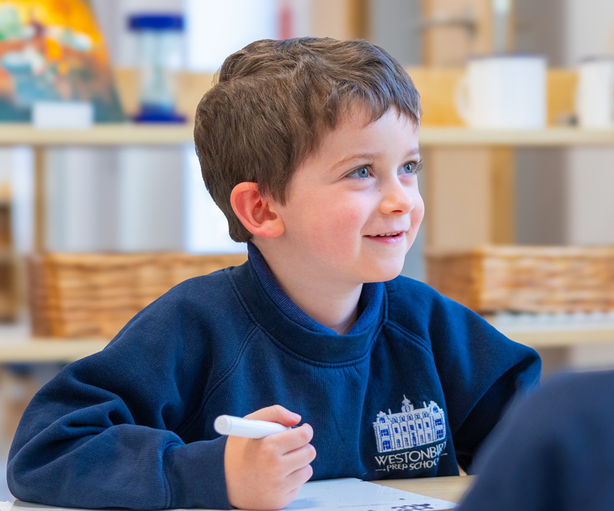 A Reception pupil takes part in a phonics lesson at Westonbirt Prep School