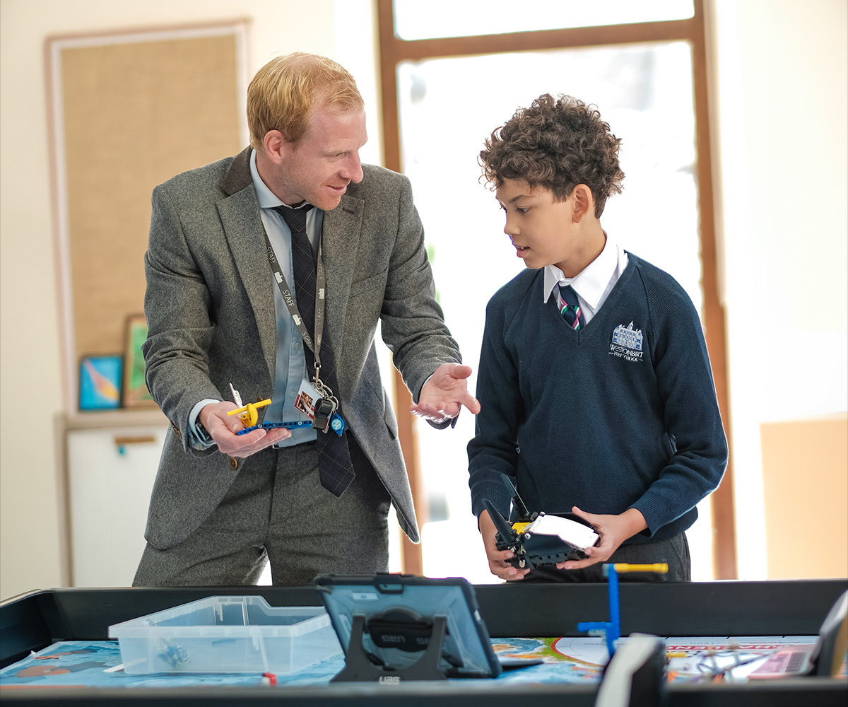A teacher delivers a Lego robotics lesson at Westonbirt Prep School