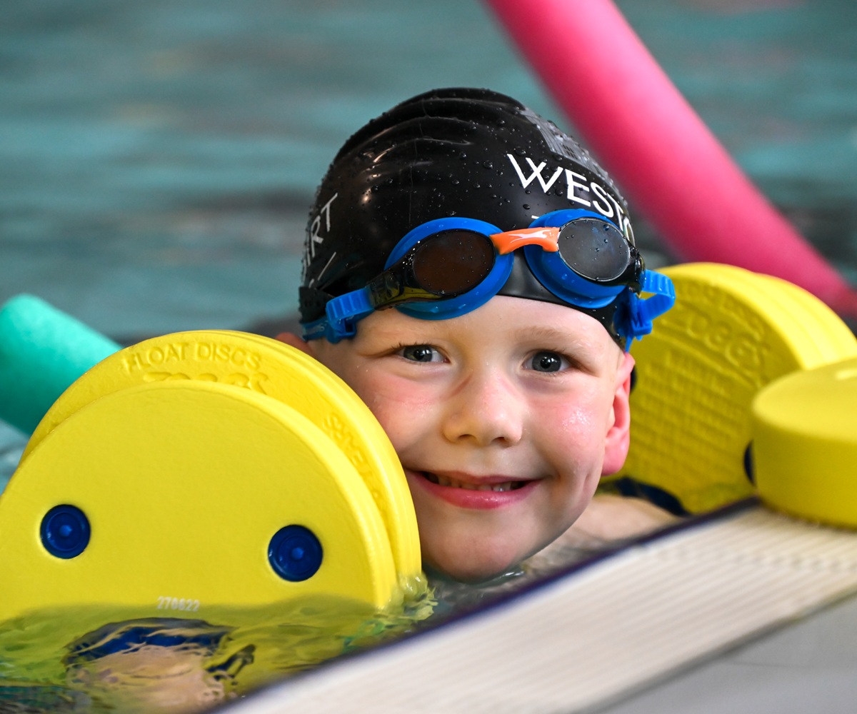 A Reception pupil takes part in a swimming lesson at Westonbirt Prep School