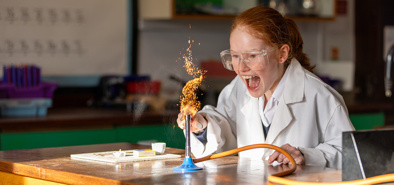 A pupil takes part in a science lesson at Westonbirt Prep School